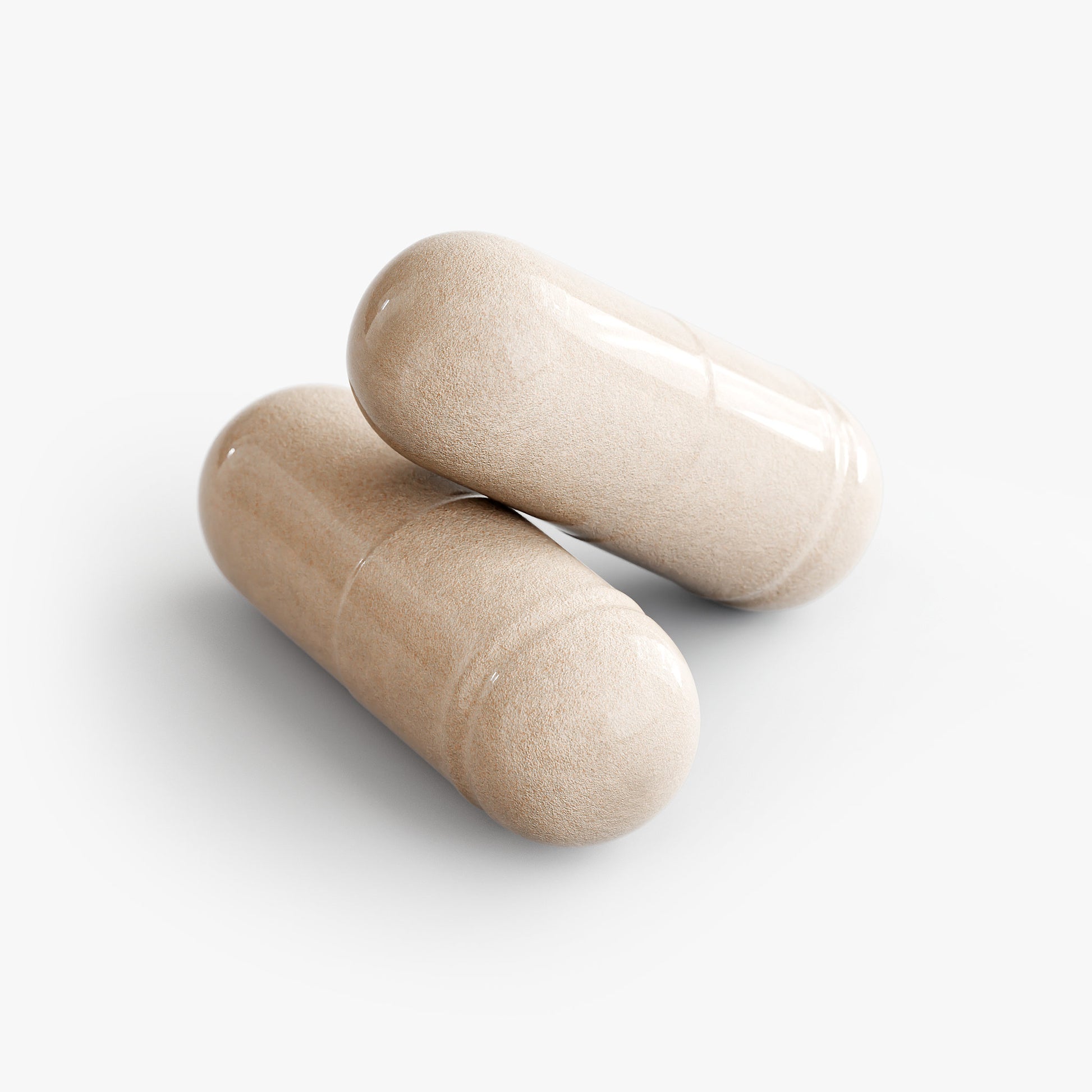 Two beige Virile Valour Brain Focus Formula Capsules For Men on a white background