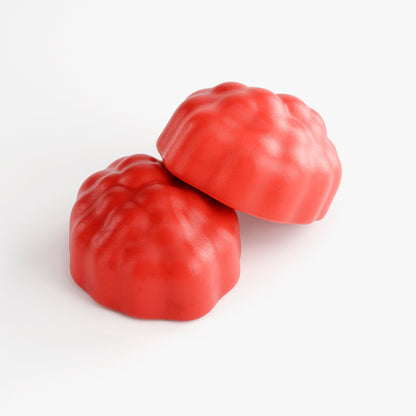 Two red Virile Valour Hair Skin Nails Gummies For Men gummy candies on a white background