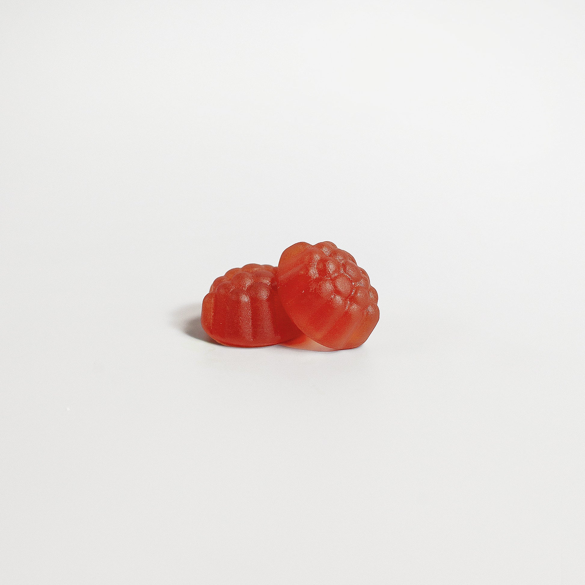 Virile Valour Sleep Well Gummies For Men Adult red gummy candies on a white background